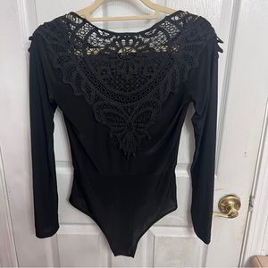 Stretchy long sleeve bodysuit w/ lace front